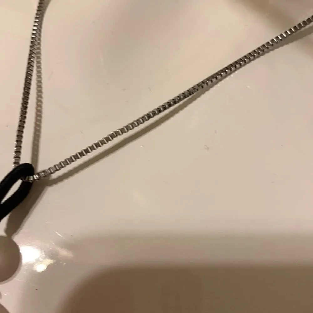 Polar Jade silvertone angel wing necklace. NWT